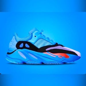 New in box deadstock Yeezy Boost 700 Hi Res Blue. Size is mens 5 / womens 6